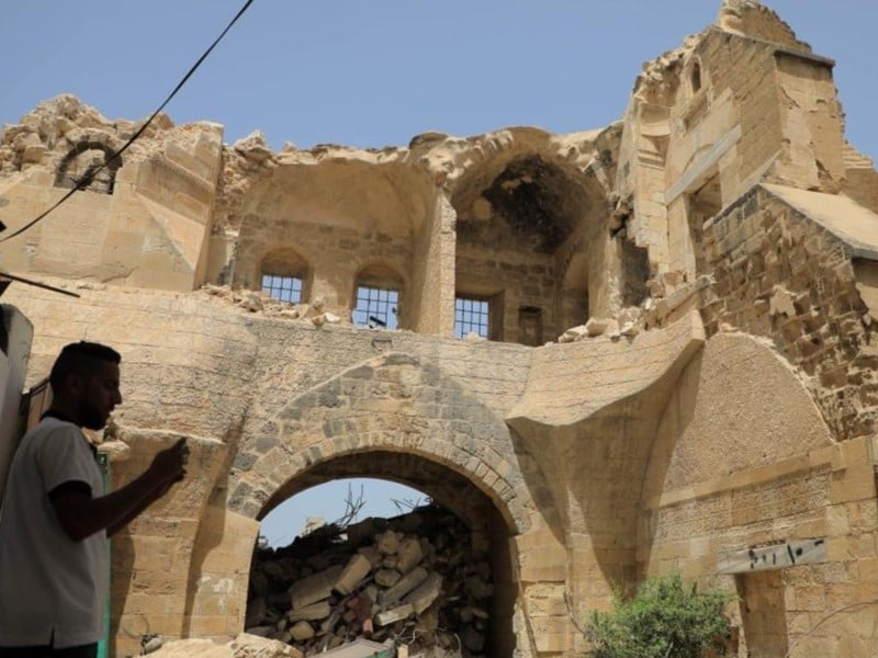 A Palestinian man inspects the historical site of Barquq Castle destroyed in the Gaza conflict in the southern Gaza Strip city of Khan Younis, on April 23, 2024. PHOTO: XINHUA