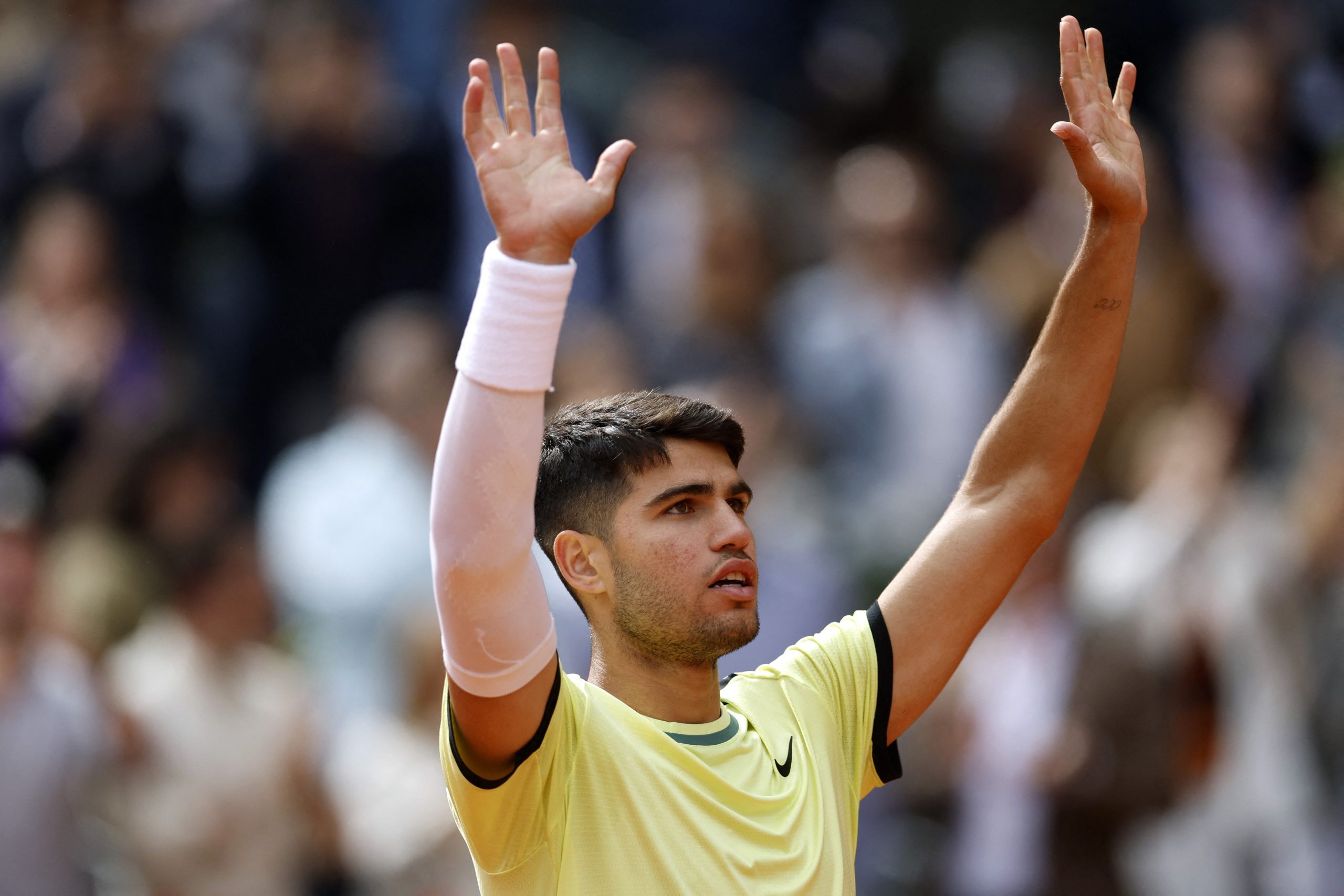 poised spain s carlos alcaraz celebrates winning his round of 64 match against kazakhstan s alexander shevchenko photo reuters