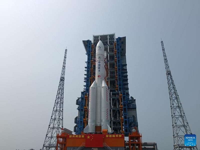 this photo taken on april 27 2024 shows the combination of the chang e 6 lunar probe and the long march 5 y8 carrier rocket having been transferred vertically to the launching area at the wenchang space launch center in south china s hainan province the chang e 6 lunar probe is scheduled for launch at an appropriate time at the beginning of may according to the china national space administration cnsa