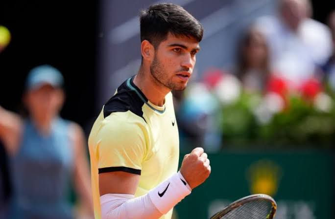 Alcaraz holds off Struff to reach Madrid quarter-finals