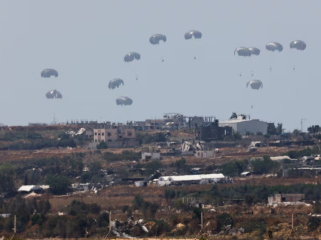 humanitarian aid falls through the sky towards the gaza strip after being dropped from an aircraft amid the ongoing conflict between israel and the palestinian islamist group hamas as seen from israel april 30 2024 photo reuters